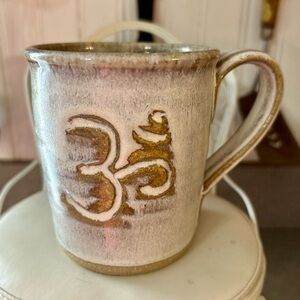 Frog Hollow Pottery Handcrafted Ceramic Om Symbol Mug in Cream and Gold